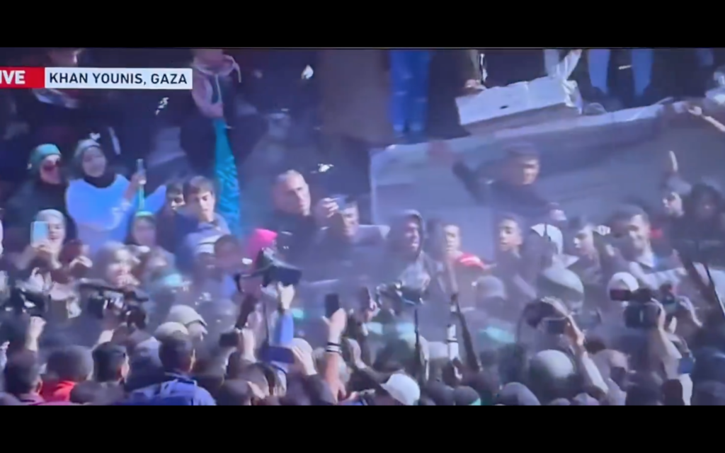 Gaza resident crowd in Khan Younis jeering at female hostage January 2025